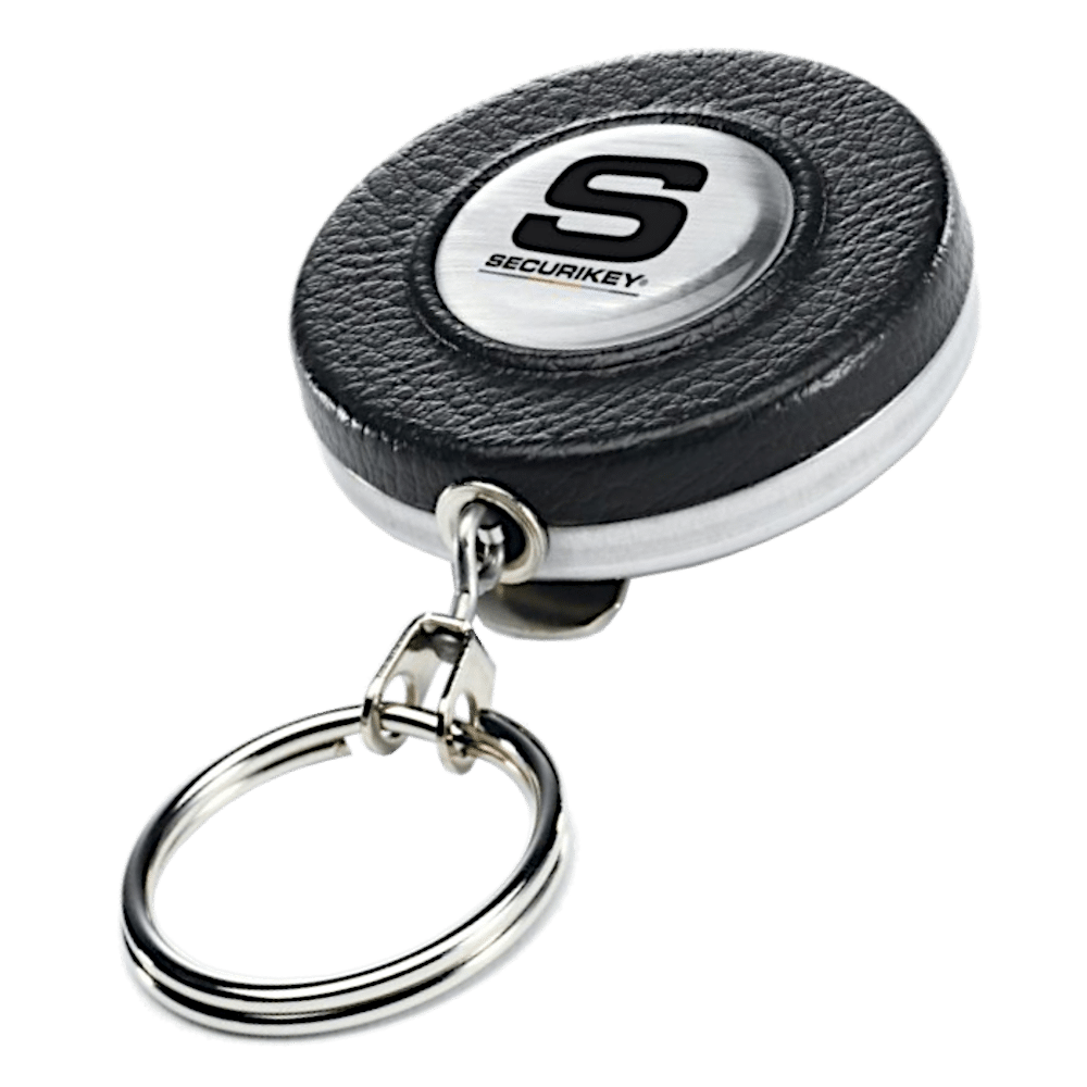 L38089_1 - Ironmongery Warehouse Round black leather key fob with a silver Securikey emblem and an attached metal key ring accessory