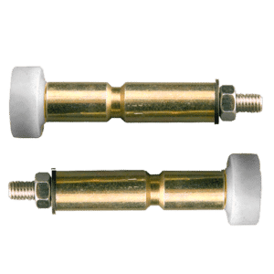 Pair of brass expansion anchor bolts with hex nuts and large silver heads, laid parallel for mounting in concrete