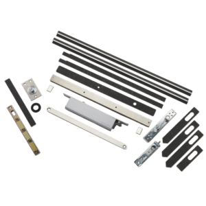 Assorted metal drawer slides, rails, and hardware pieces laid out on a black background for assembly use.