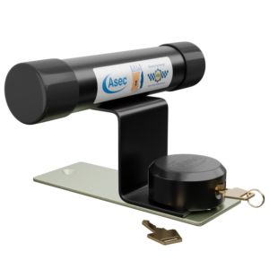 Wall-mounted security lock with a large cylindrical mechanism and two keys on a metal plate.