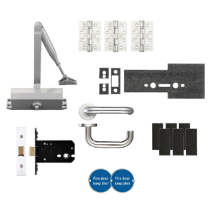 Complete door hardware kit with a door closer, hinges, lever handle, strike plates, latch, mounting plates, and blue fire-door keep-shut signs.