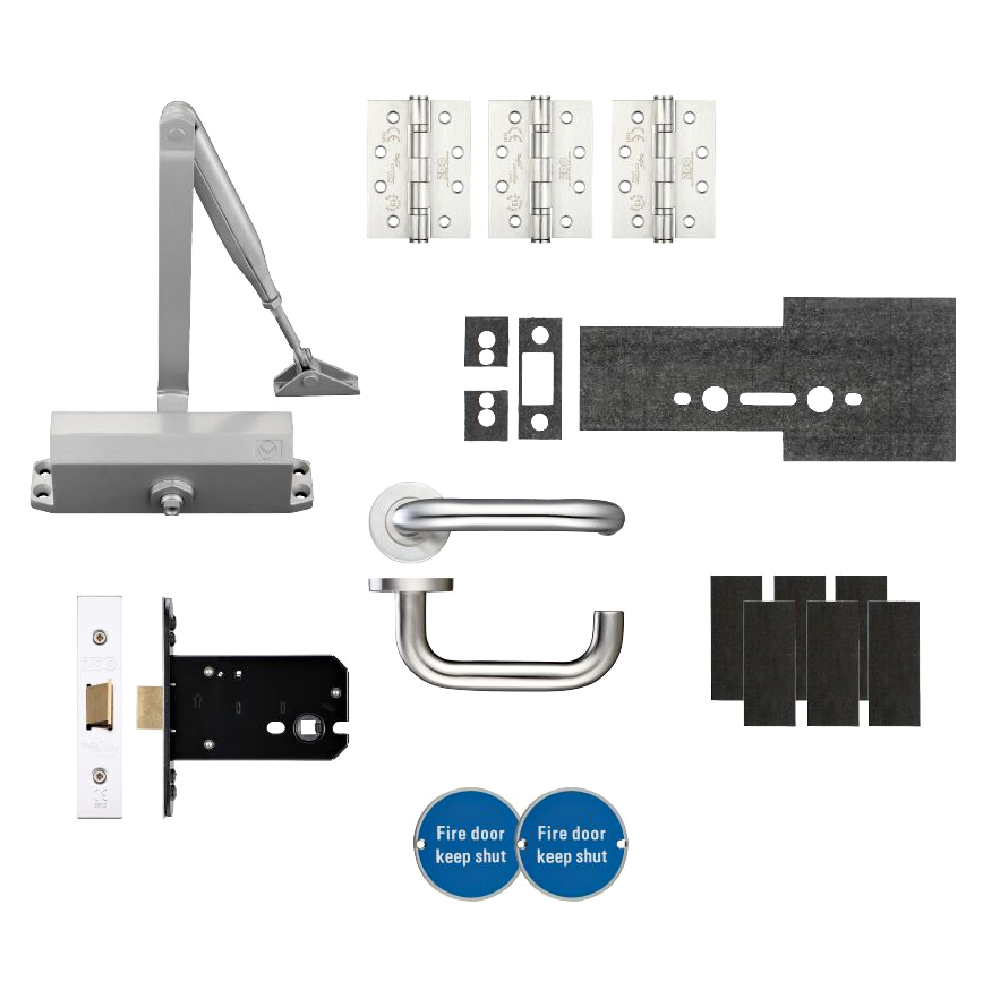 L38367_1 - Ironmongery Warehouse Complete door hardware kit with a door closer, hinges, lever handle, strike plates, latch, mounting plates, and blue fire-door keep-shut signs.