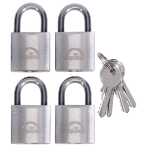 Four silver padlocks arranged in a square with a bunch of keys on the right side, indicating a lock-and-key security set.