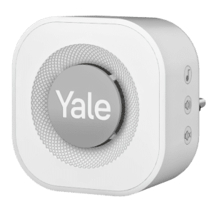 Front view of a white Yale smart door lock with a large textured dial bearing the Yale logo.