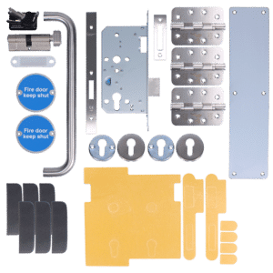 Assorted mortise lock hardware kit: door handle, lock case, strike plates, hinges, keyhole plates, screws, and mounting templates