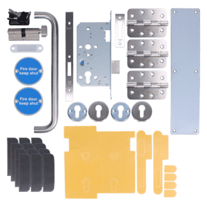 Complete door hardware kit laid out: lock body, strike plates, hinges, handle, blue ‘Fire door keep shut’ signs, and cutout templates.